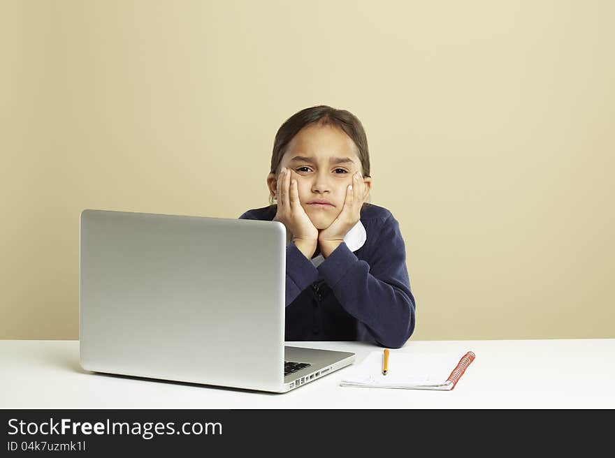 Young girl using laptop