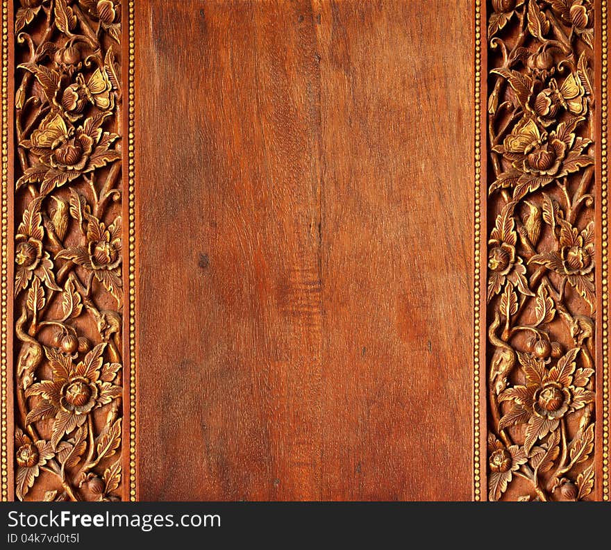 Old worn wooden board with oriental ornament. Old worn wooden board with oriental ornament.