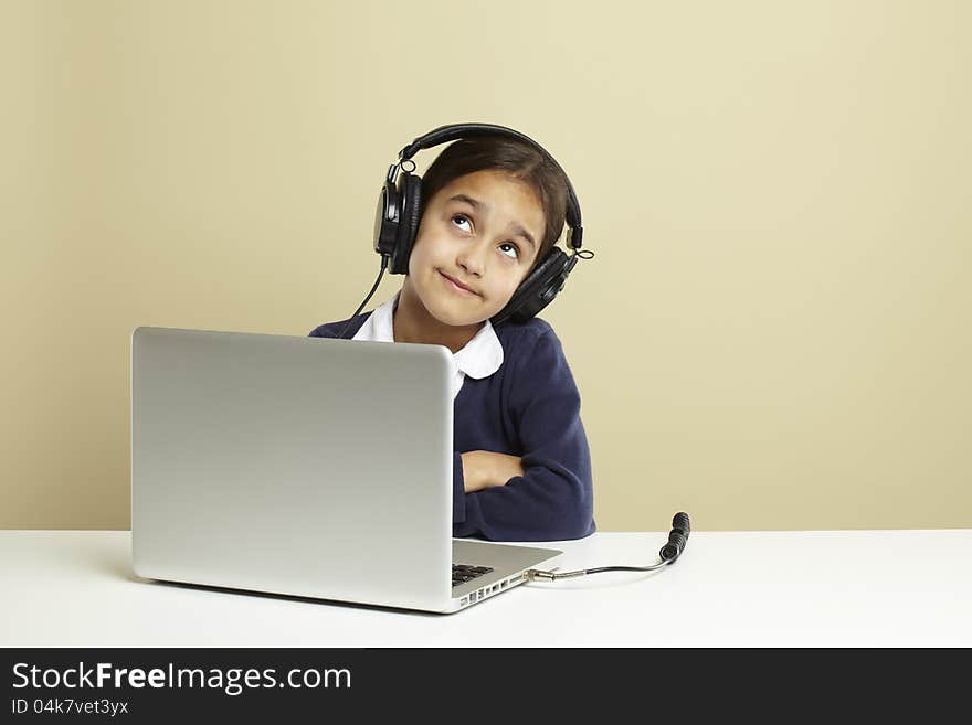 Young girl using laptop