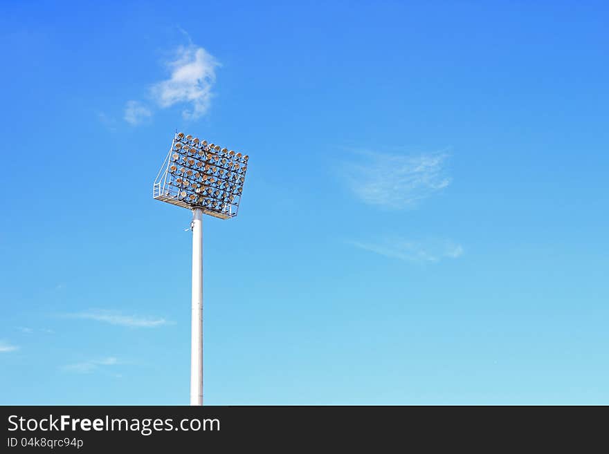 Stadium light on blue sky ,Floodlight from a stadium with the sky as a background.