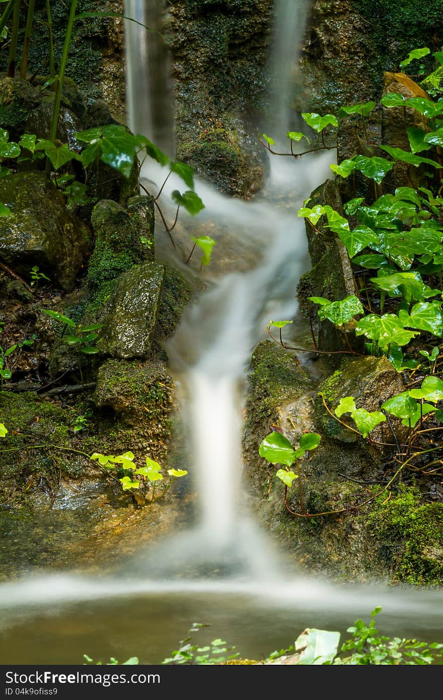 Beautiful veil cascading waterfalls, mossy rocks