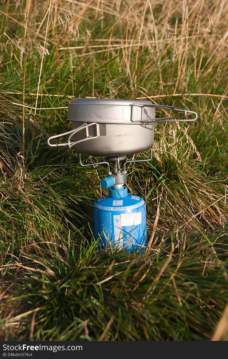 Outdoor gas cooker & mess tin. Cooking on a trekk