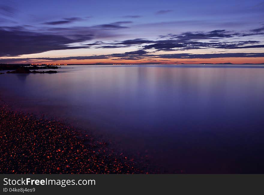 Seaside. Coast at night in Skerries, Ireland. Long exposure.