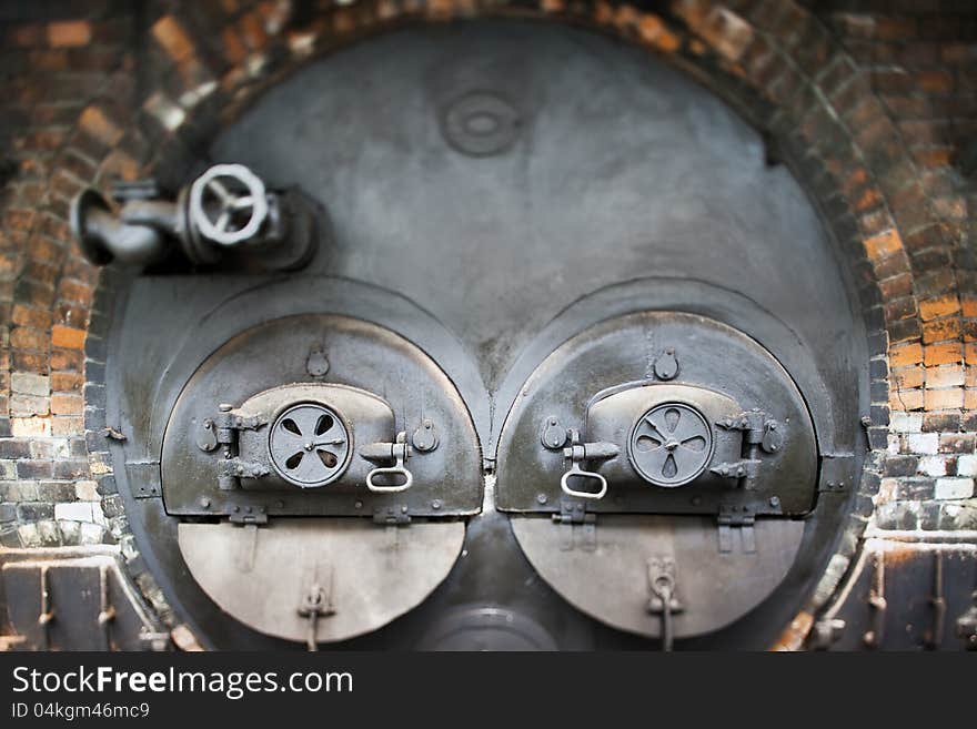 Heating stove in old factory (tilt lens). Heating stove in old factory (tilt lens)