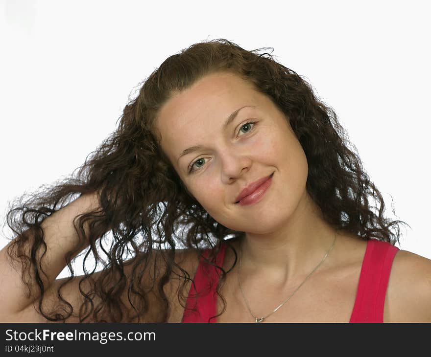 Smiling dark-haired girl in red, hair corrects, white background