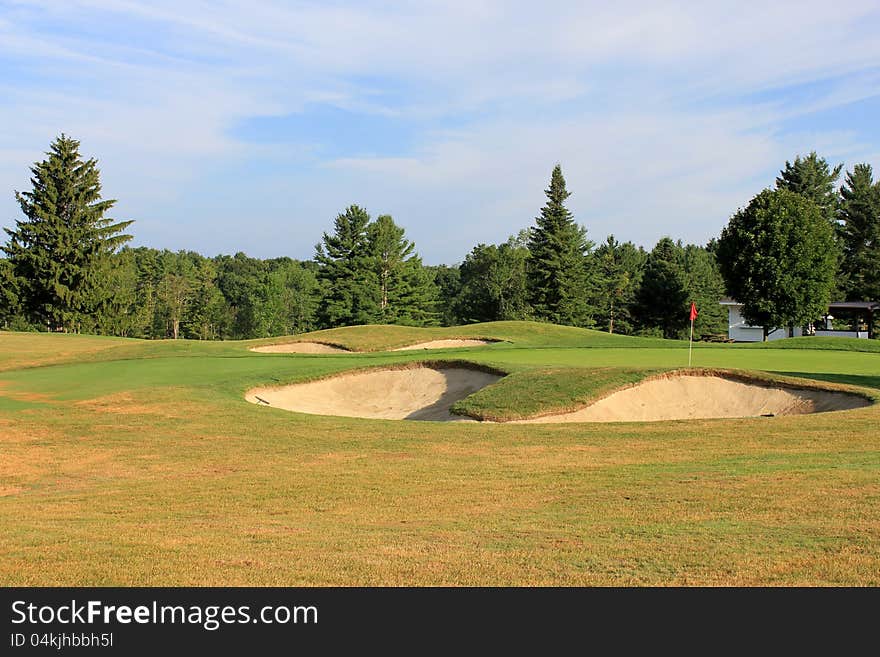 Golf rakes and sandtraps