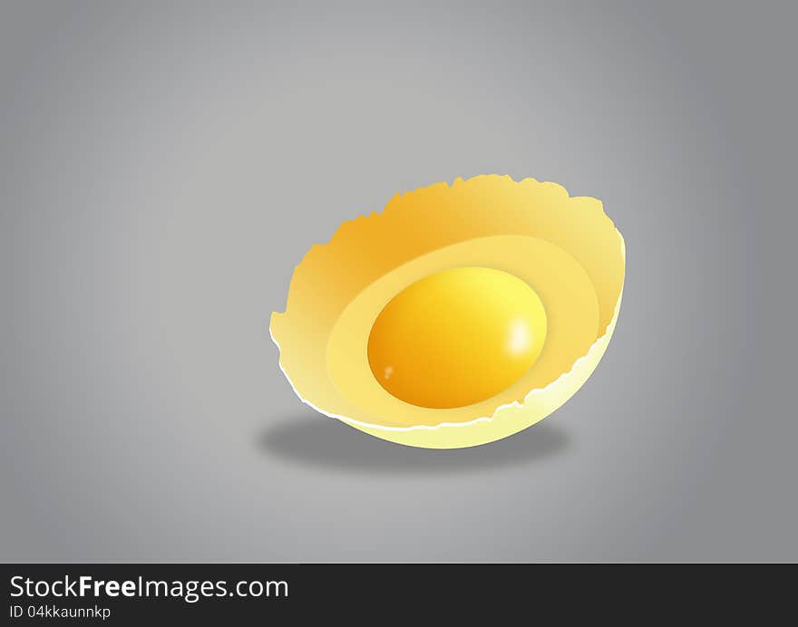 Broken egg on a grey background