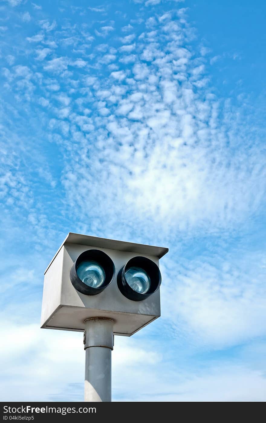 Road side of street lights and the peculiar clouds. Road side of street lights and the peculiar clouds