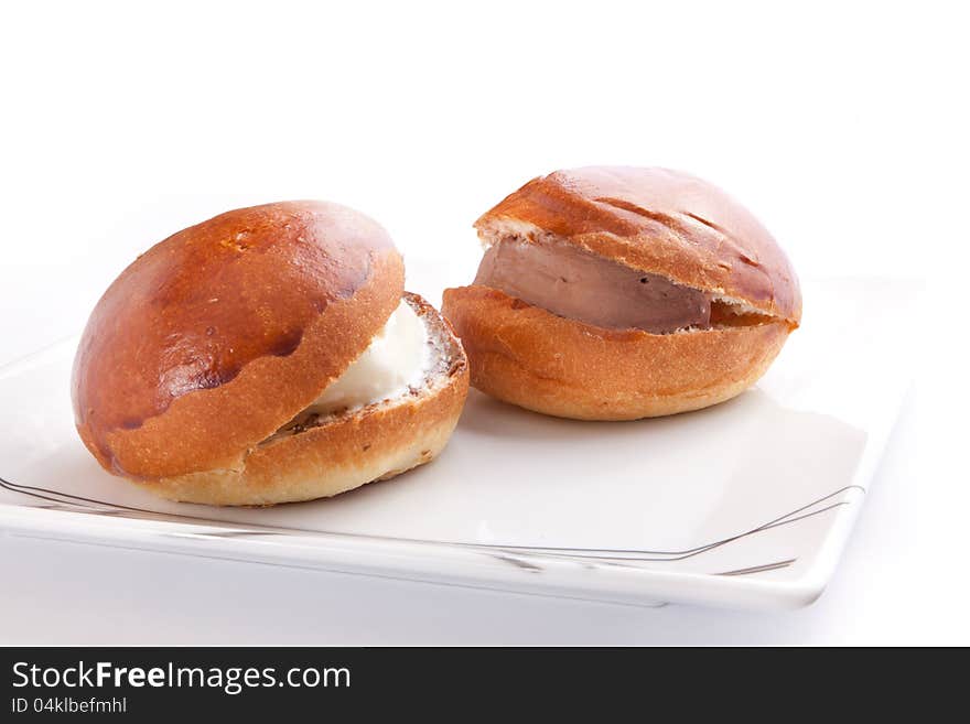 Tow Ice Cream Sandwich Isolated On White vanilla and chocolate in bread