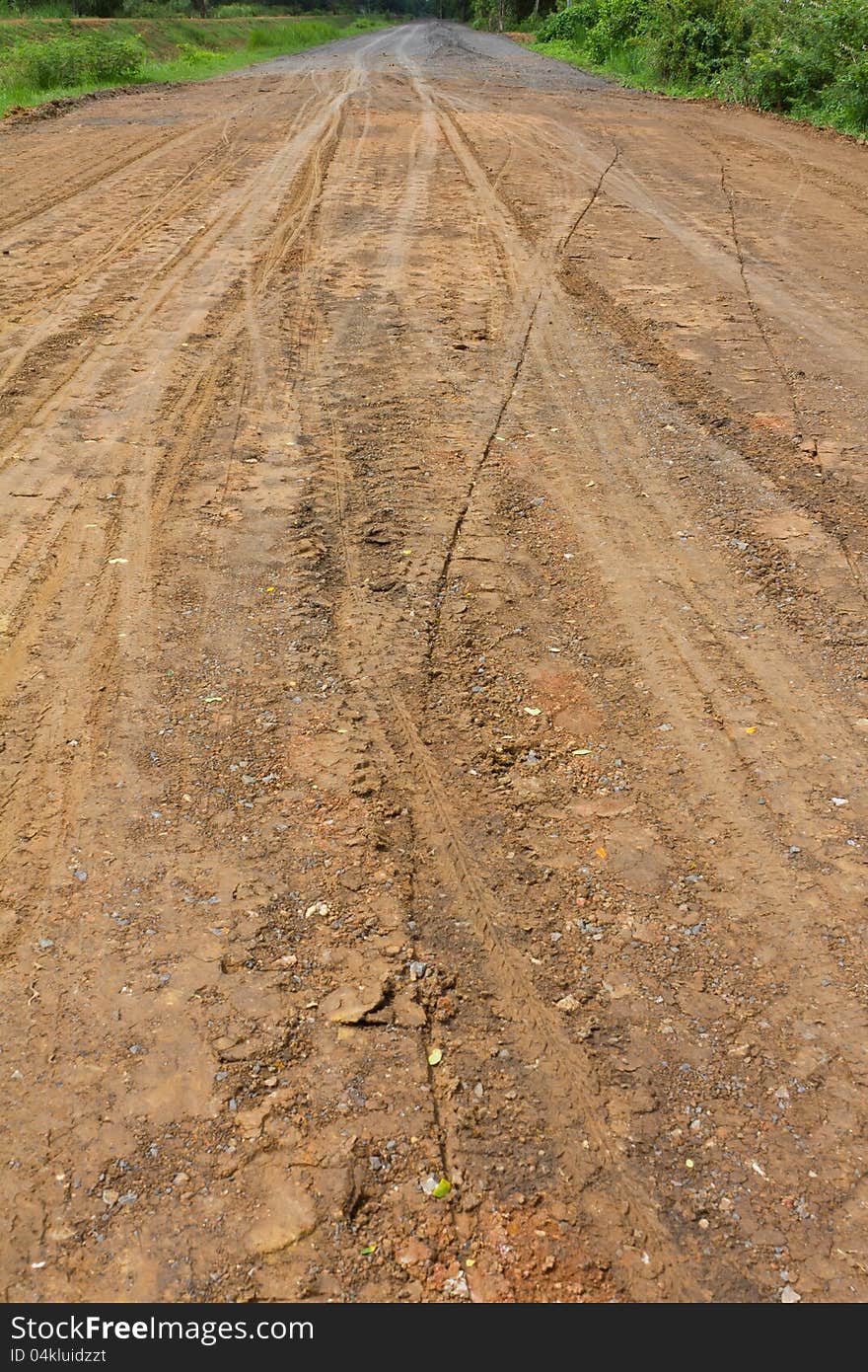 Trace of wheels on the ground in rural areas.