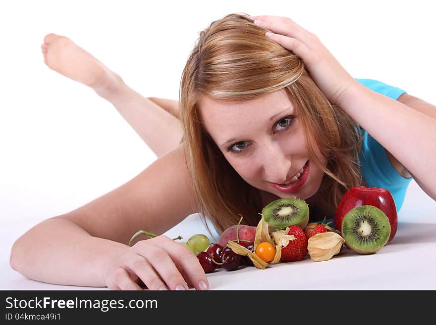 Smiling young woman with fruits