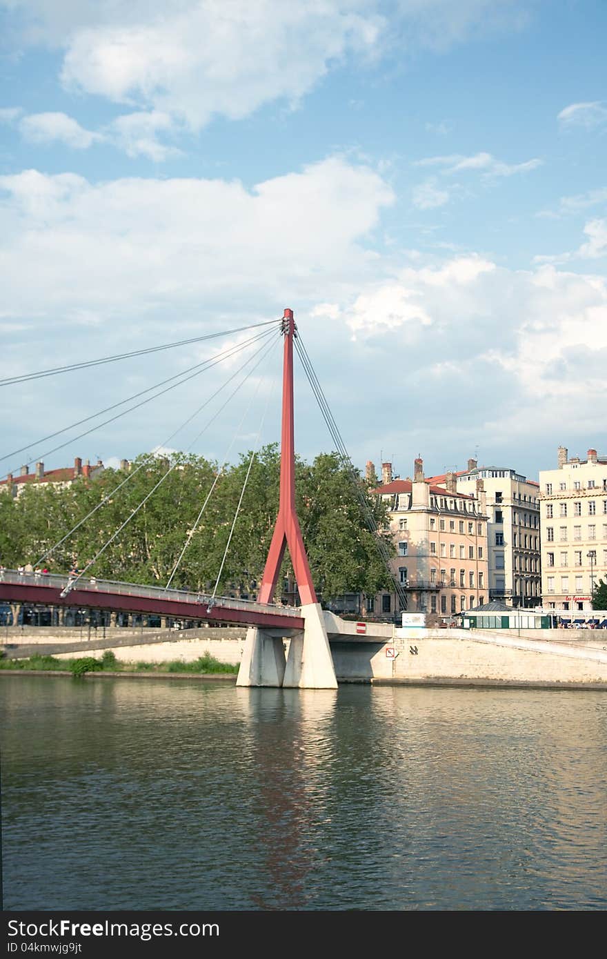 Footbridge Palais de Justice, Saone river, a view from Romain Rolland quay, Lyon, France. Footbridge Palais de Justice, Saone river, a view from Romain Rolland quay, Lyon, France