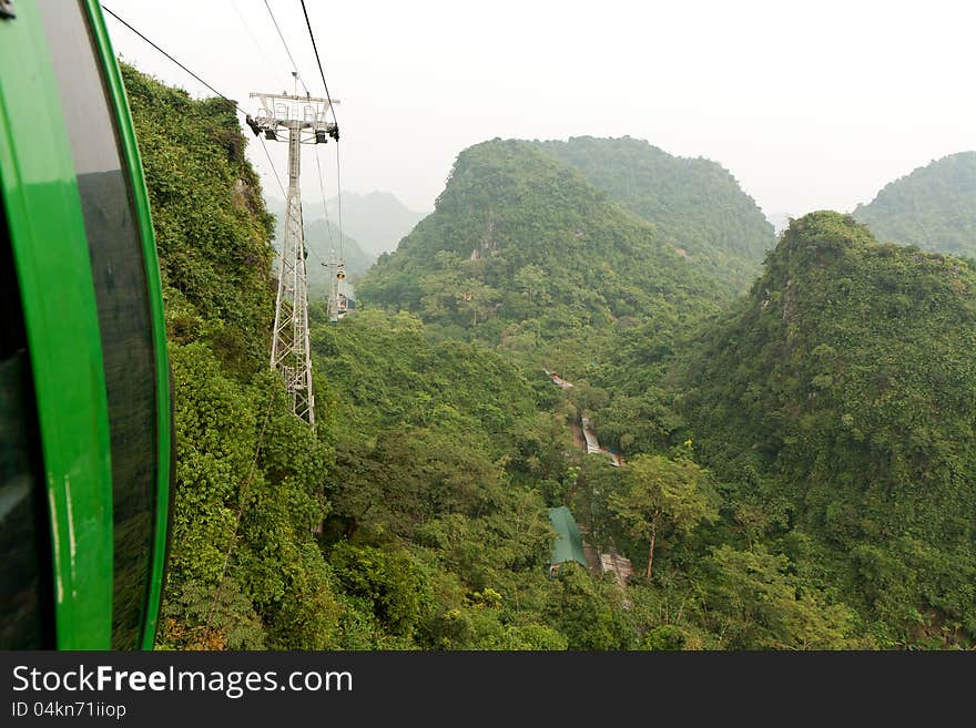 Amazing view of green and lush hills from a cable car in Vietnam. Amazing view of green and lush hills from a cable car in Vietnam.