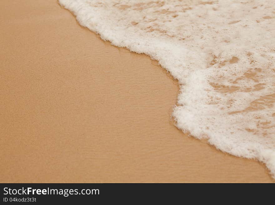 Sea surf macro on clean sand beach. Sea surf macro on clean sand beach