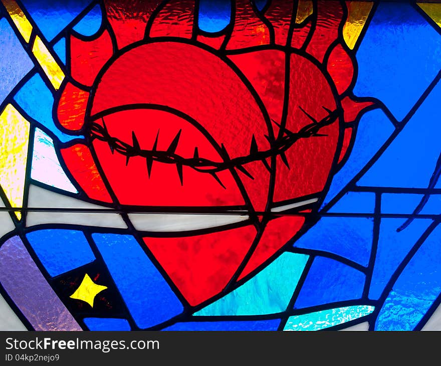 Beautiful red heart in stain glass in Florida church.