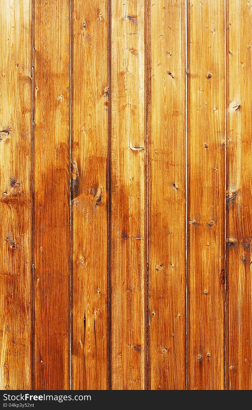 The red wooden boards close up.