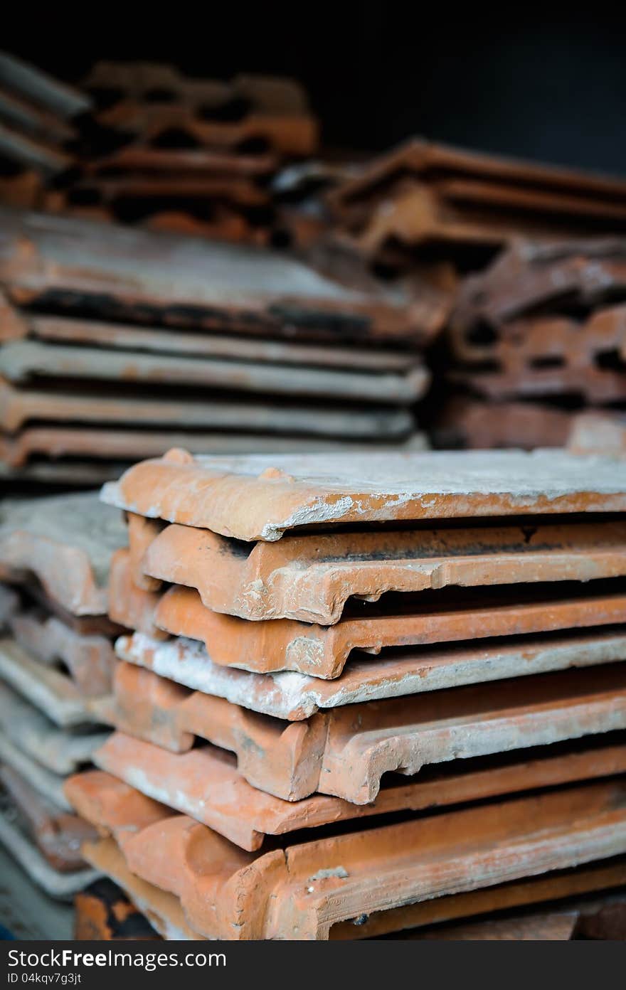 Stack of the orange tiles in warehouse. Stack of the orange tiles in warehouse