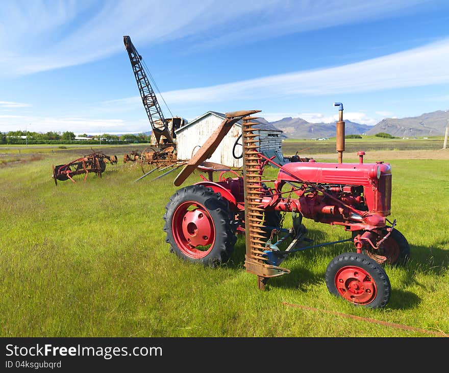 Picture of a tractor and abandoned machines