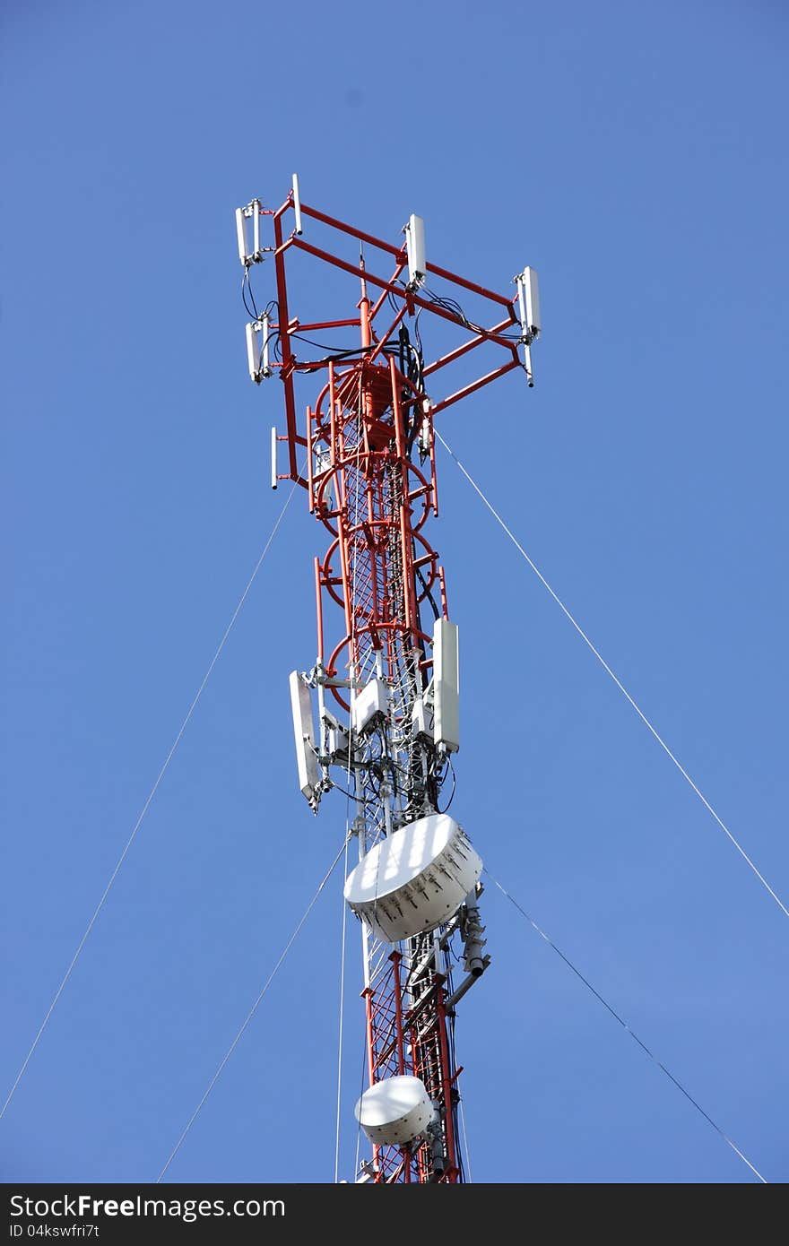 Phone antenna on a tall building. Phone antenna on a tall building.