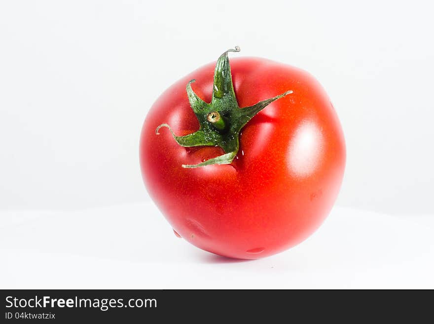 Fresh tomato, isolated on white background