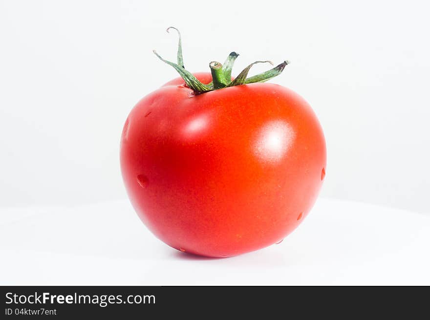 Fresh tomato, isolated on white background