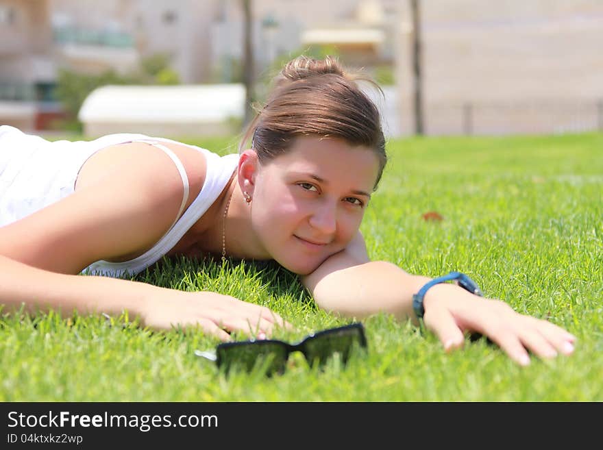 She is enjoying the clean, green with fresh grass. She is enjoying the clean, green with fresh grass