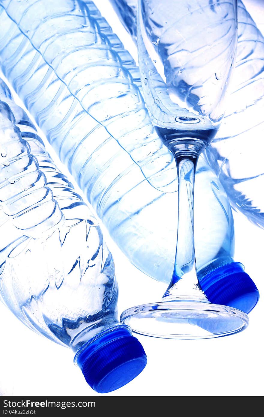 Bottles contain pure water  and glass, isolated on white