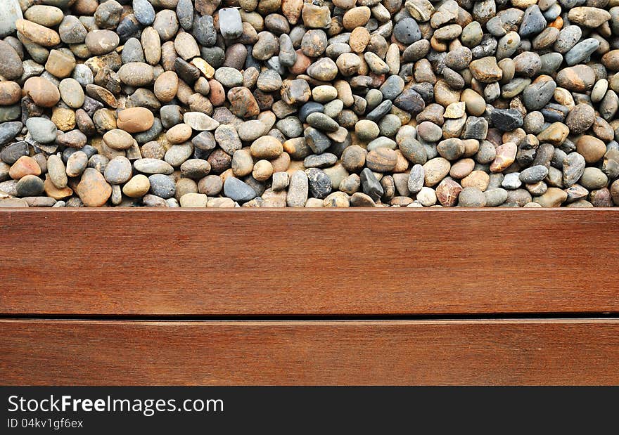 Pebble stone and wood texture. Pebble stone and wood texture