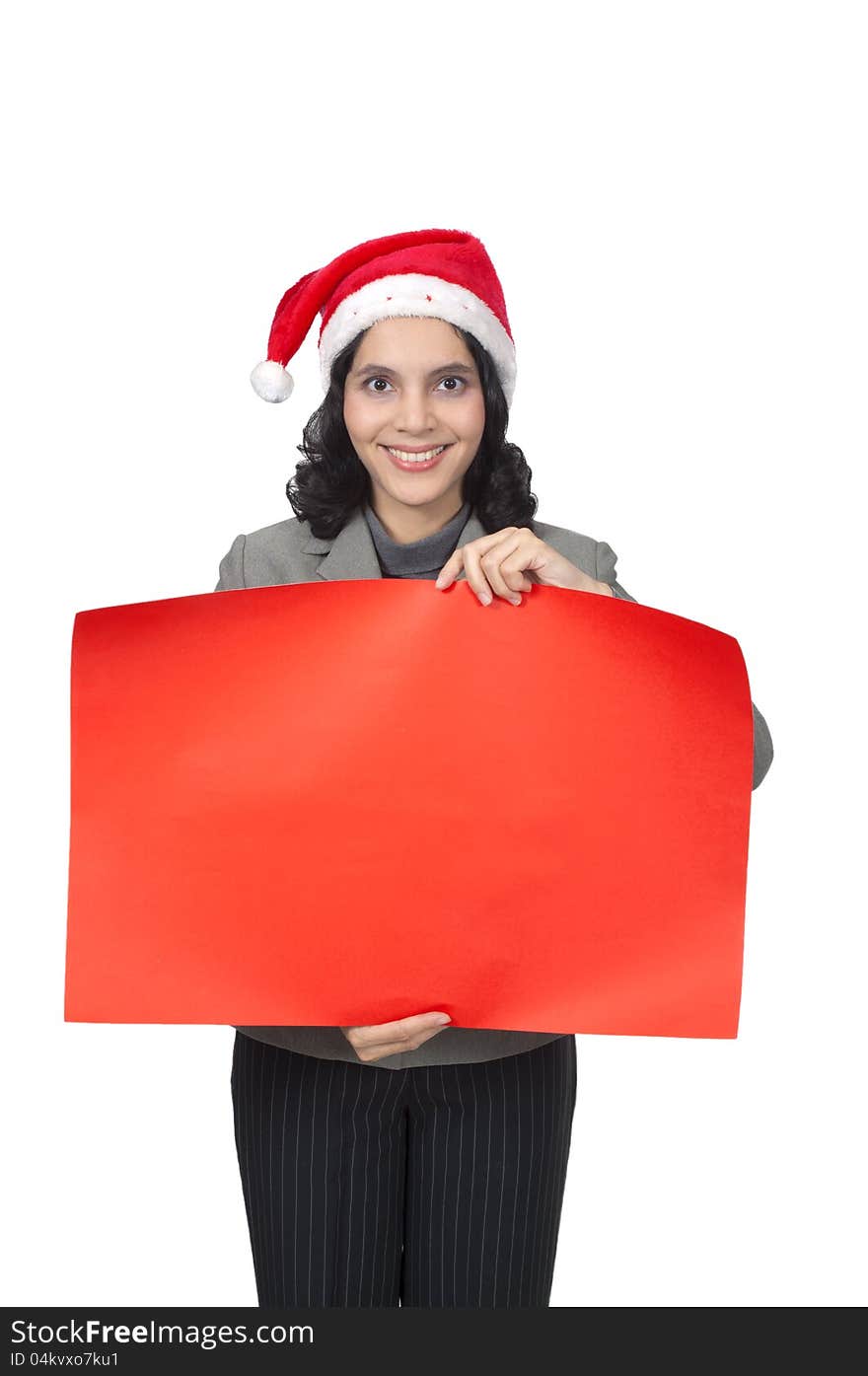 Woman wearing santa hat holding red banner isolated over white background. You can put your message on the banner. Woman wearing santa hat holding red banner isolated over white background. You can put your message on the banner