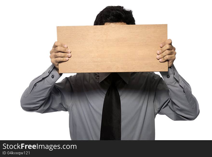 Business man wearing shirt and tie holding wooden board. You can put your message on the board