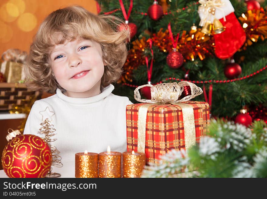 Happy smiling child with Christmas decorations. Happy smiling child with Christmas decorations