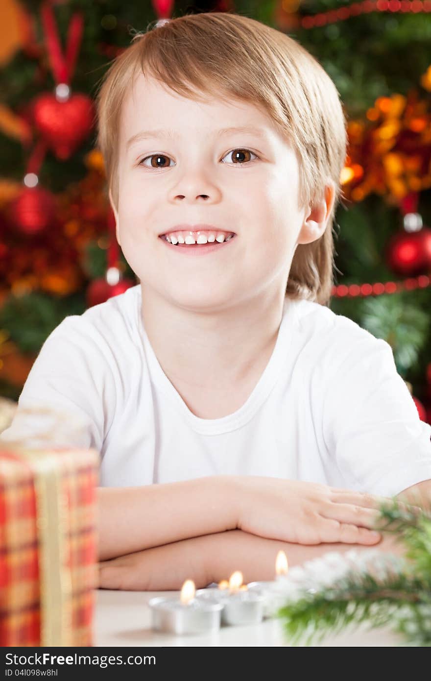 Portrait of happy boy against Christmas lights background. Portrait of happy boy against Christmas lights background