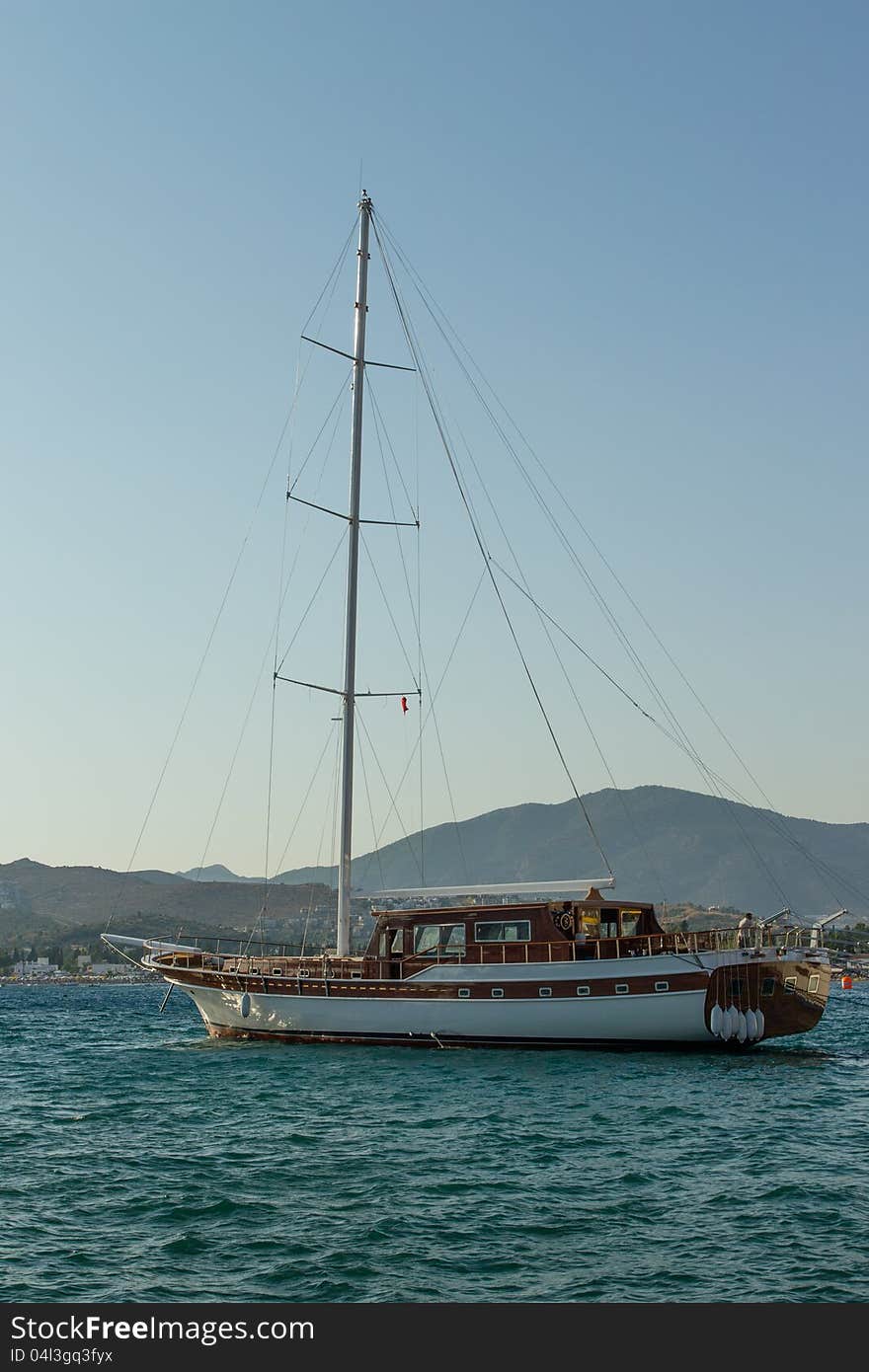 Anchored yacht in Bitez bay, Bodrum district (Muğla Province) in summer, Turkey