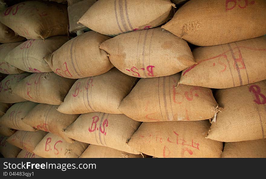 Pile Of Sacks Stored In Warehouse