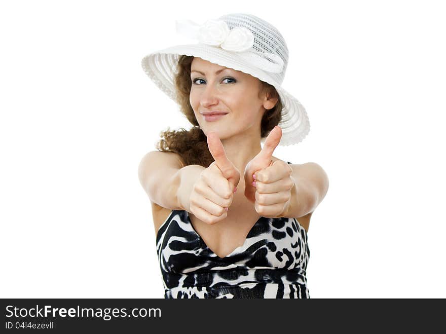 Girl in the hat indicates the sign of ok. Girl in the hat indicates the sign of ok