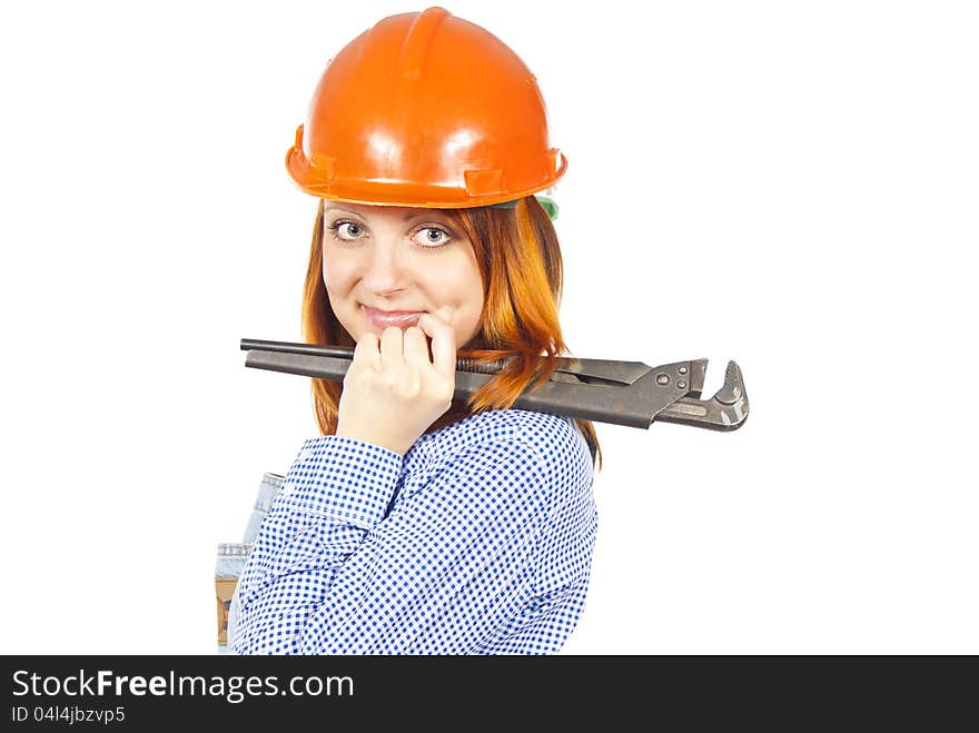 Builder girl in a helmet and a key