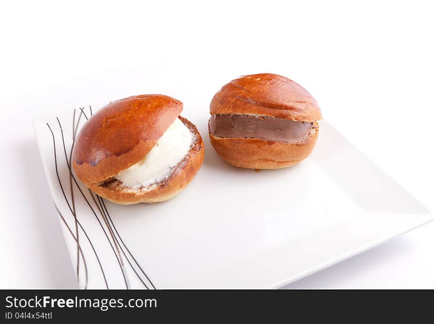 Tow Ice Cream Sandwich On White vanilla and chocolate in bread