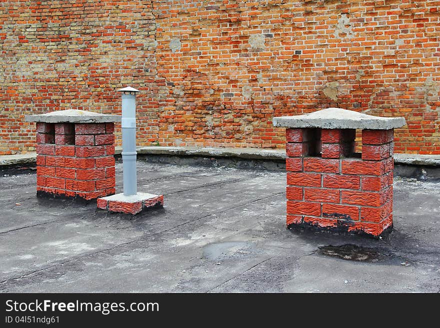 Brick chimneys inside the castle in Lutsk, Ukraine. Brick chimneys inside the castle in Lutsk, Ukraine