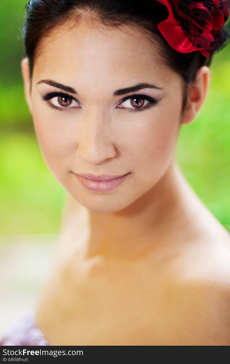 A close up portrait of a brunette beautiful girl. A close up portrait of a brunette beautiful girl