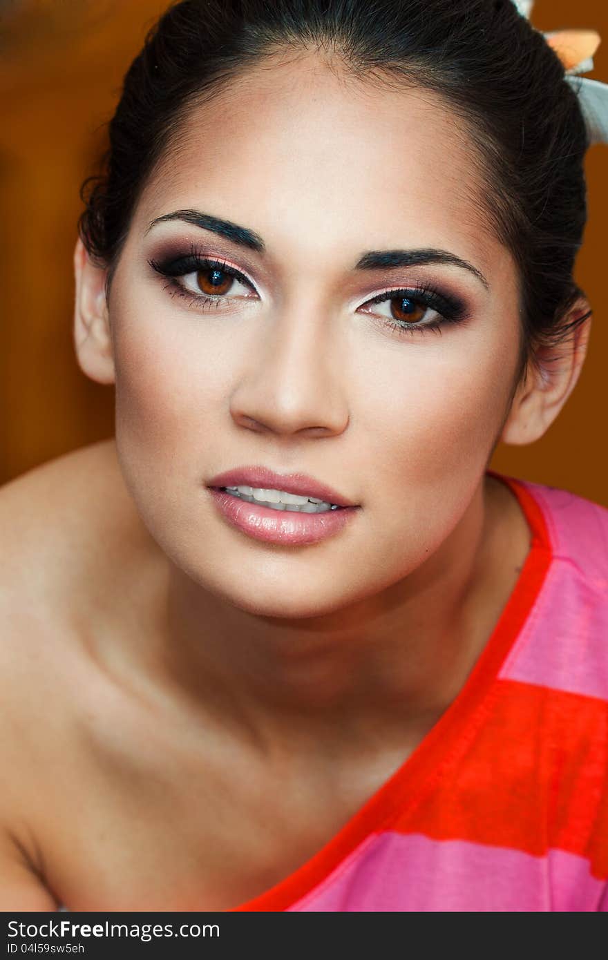 A close up portrait of a brunette beautiful girl. A close up portrait of a brunette beautiful girl