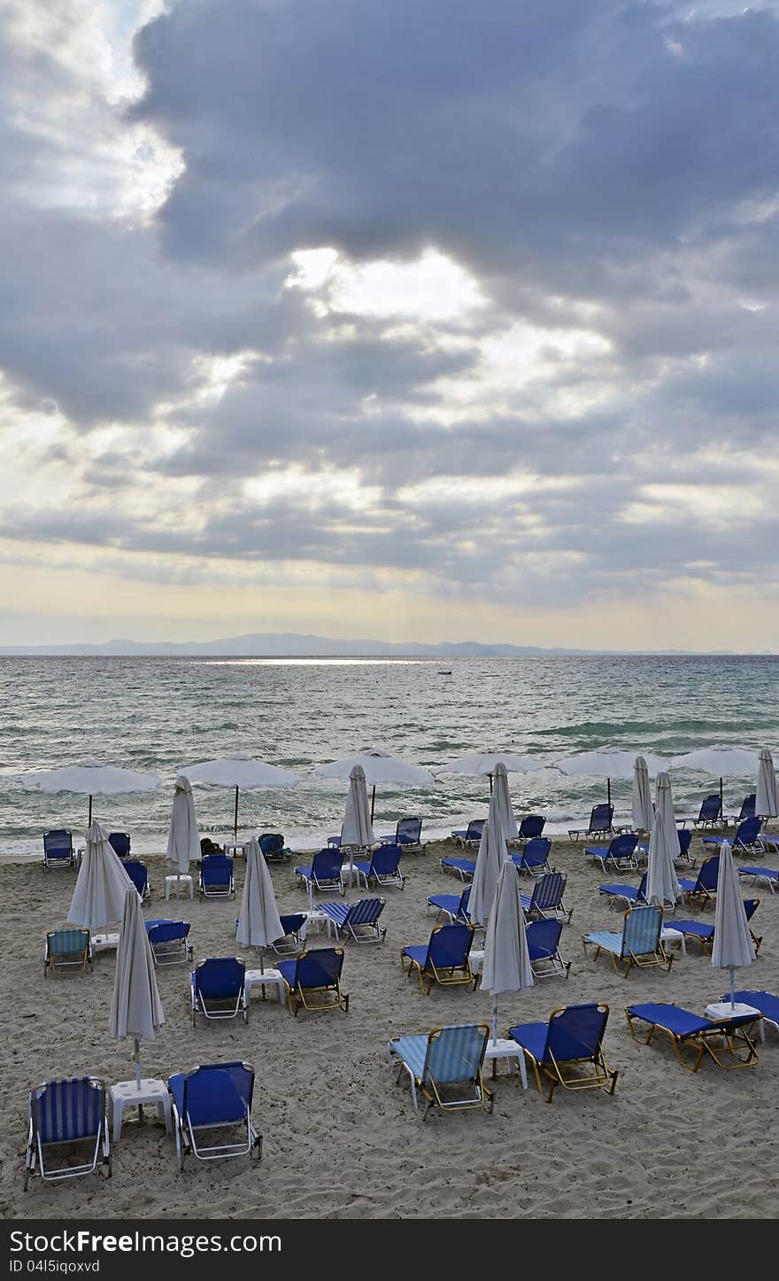 Beach umbrellas on Halkidiki beach in Greece, July, 2012. Beach umbrellas on Halkidiki beach in Greece, July, 2012