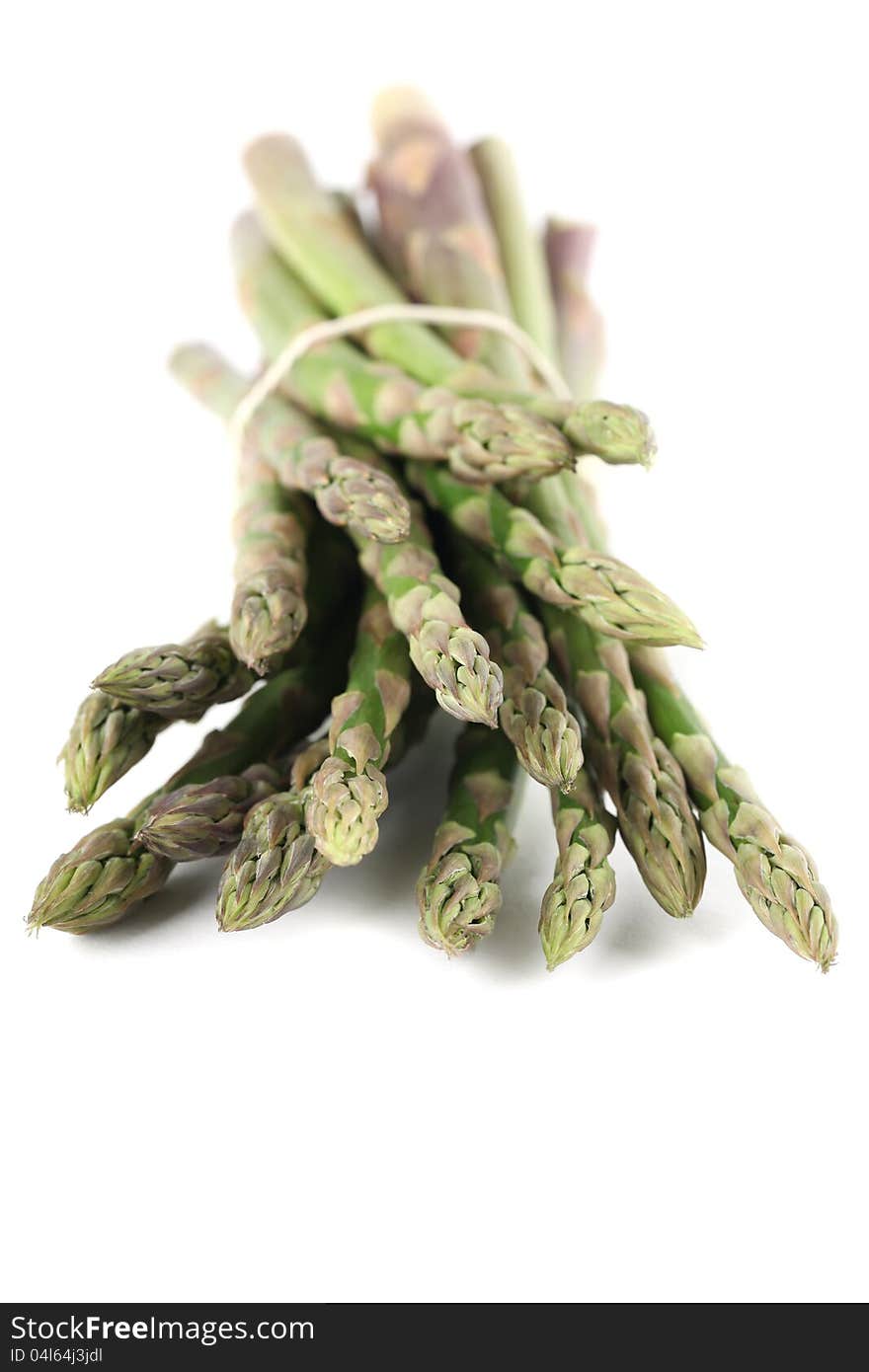 Bunch of fresh organic green asparagus on white background