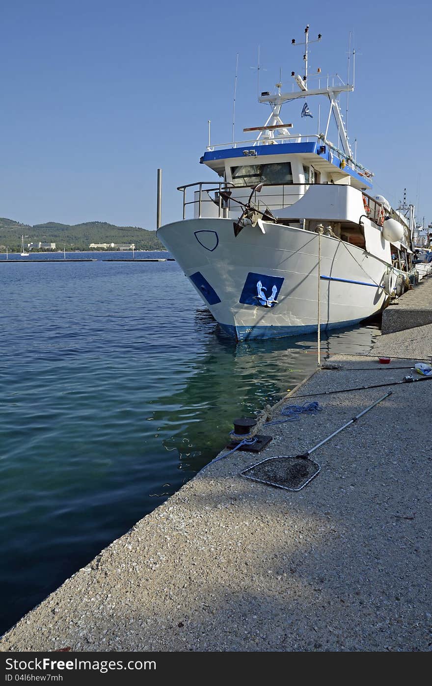 Scenic view of boats moored in Halkidiki harbor of Neo Marmara, Greece. Scenic view of boats moored in Halkidiki harbor of Neo Marmara, Greece.