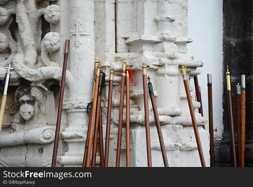 Romeiros are groups of men, praying, walk the walk for a week, throughout the Sao Miguel island. Besides the cloth bag they transport a “bordão”, wooden stick to help them walk, a scarf and shawl. As they walk they stop at chapels and churches and pray in a special ritual and they left outside the wooden sticks. Romeiros are groups of men, praying, walk the walk for a week, throughout the Sao Miguel island. Besides the cloth bag they transport a “bordão”, wooden stick to help them walk, a scarf and shawl. As they walk they stop at chapels and churches and pray in a special ritual and they left outside the wooden sticks.