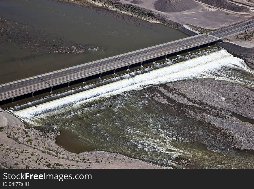 Water running under bridge and road in East Mesa, Arizona. Water running under bridge and road in East Mesa, Arizona