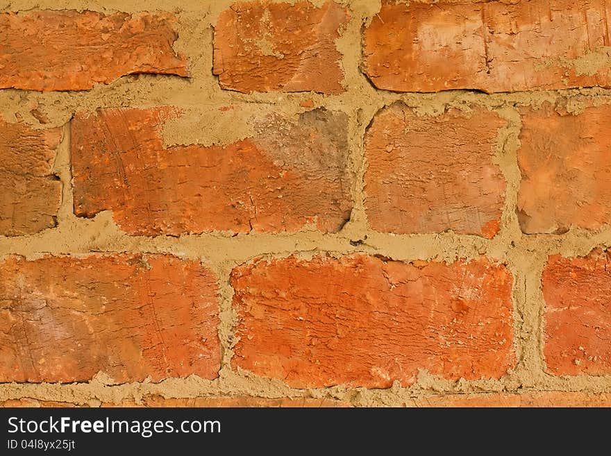 Background of vintage rough brick texture (close-up). Background of vintage rough brick texture (close-up)