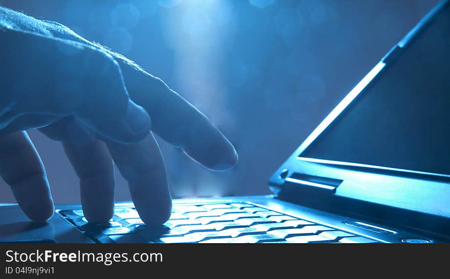 Close-up of typing businessman hands Bokeh. Close-up of typing businessman hands Bokeh