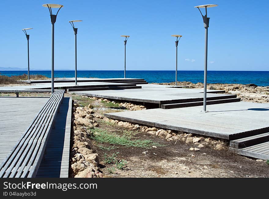 The road to the sea and lampposts in Cyprus