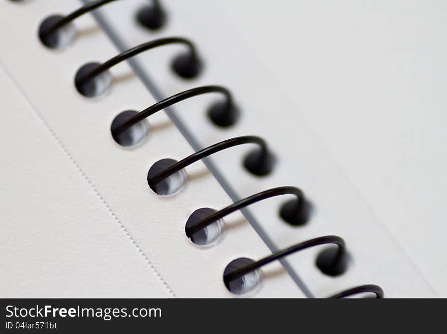 Close-up of an empty notebook with whites pages