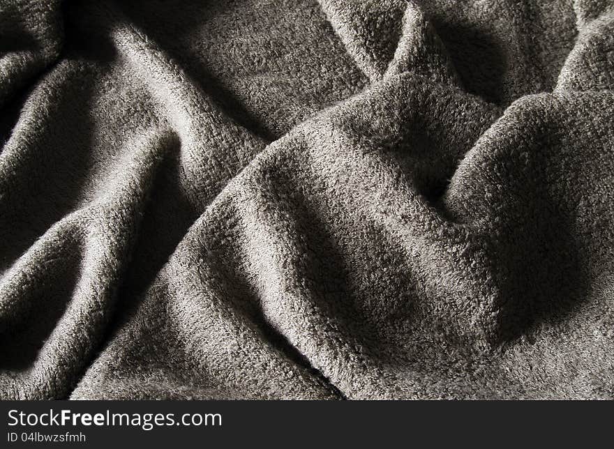 Wrinkles of the grey towel